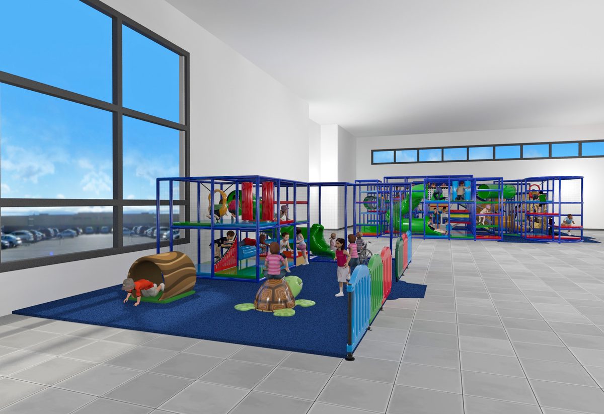 Children playing across the full Play Iron Range play area
